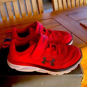 Under Armour red and black shoes. Size 12K
